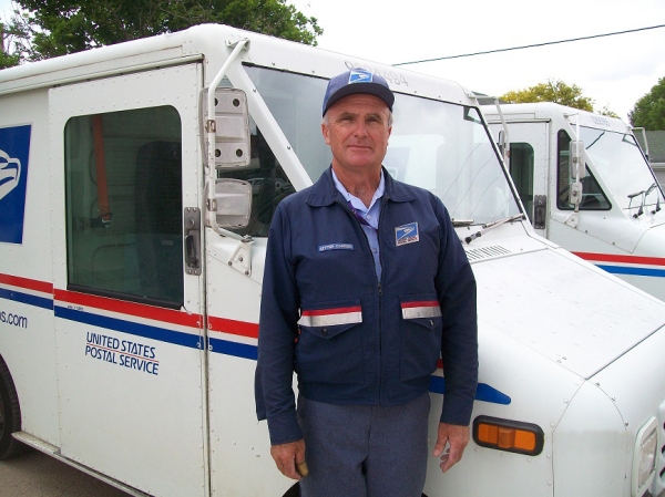Norton, KS, City Carrier Chris Noel taught visiting kindergarteners how to be safe around postal vehicles.